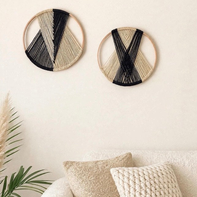 Decorative wall art hanging on the wall over a sofa 